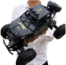 Carregar imagem no visualizador da galeria, Carrinho de Controle Remoto 4X4 Monster Truck 28cm - Loja Varietah Kids
